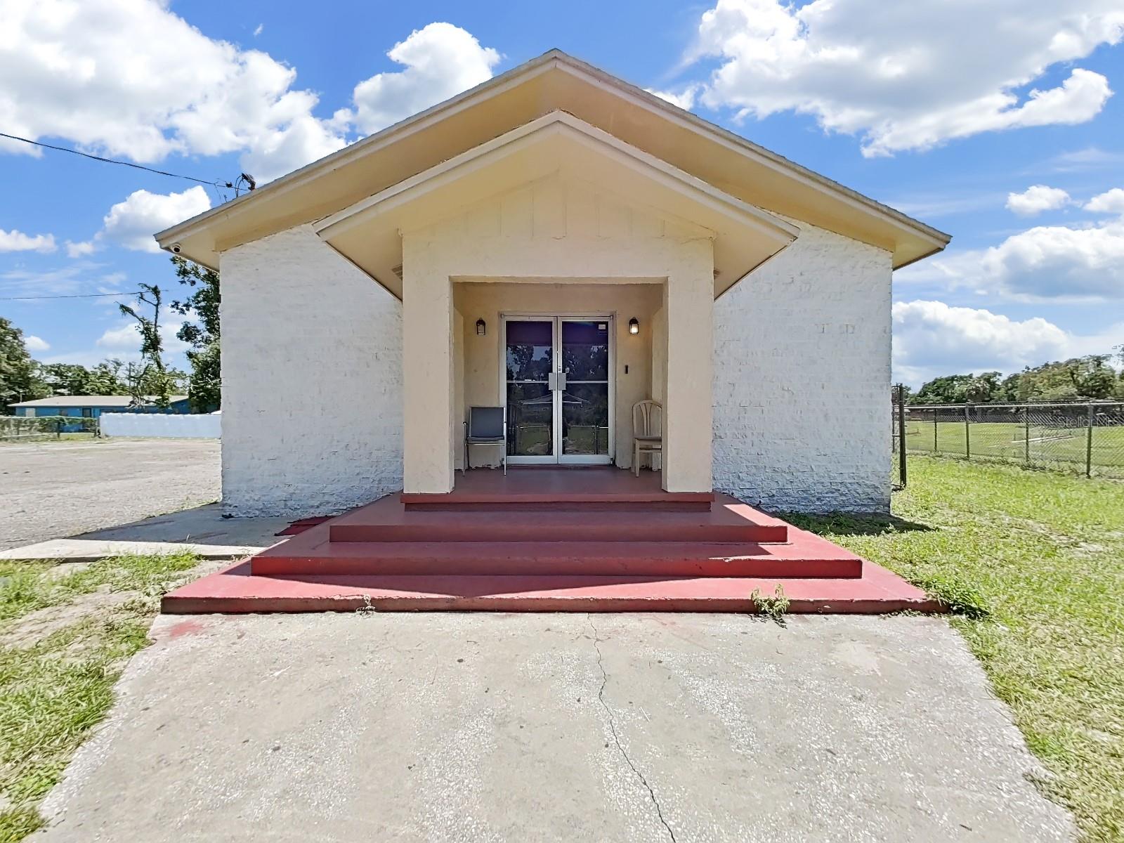 Welcome to 3201 E Genesee St, a versatile assembly building located in the heart of Tampa, offering a generous 16,350 SqFt lot with ample space for your organization or business needs. This fully fenced property features over 30 parking spaces, four updated bathrooms, and additional storage including two sheds that convey with the sale. Recent improvements made in 2022 include a new roof, updated electrical and plumbing systems, renovated ceilings and flooring, and modernized bathrooms. An unpermitted addition was completed in 2023, offering even more functional space. Please note that all instruments and TVs are excluded from the sale, but the security camera system will remain. This is a rare opportunity to secure a move-in-ready facility with room to grow in a well-connected Tampa location.