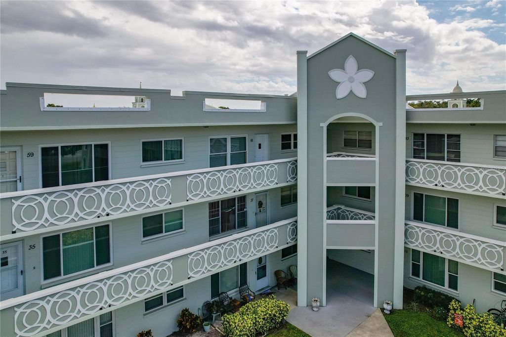 Photo of 2257 World Parkway Boulevard W #61, Clearwater, FL 33763 (MLS # O6319073)