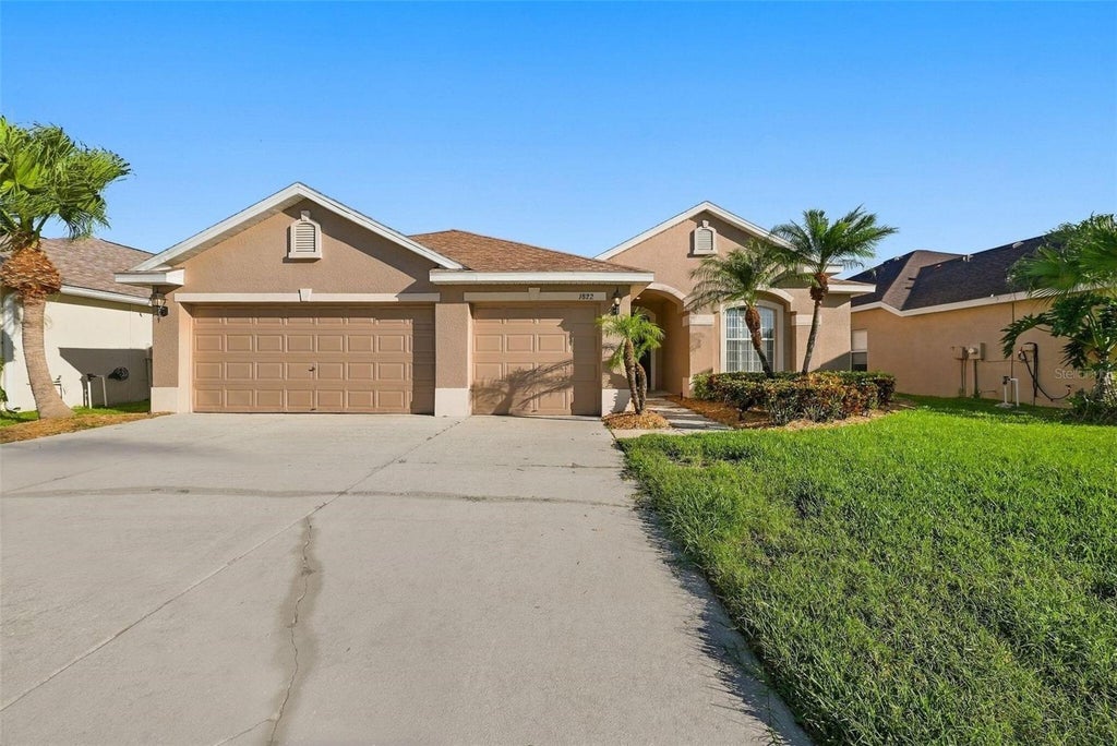 Photo of 1822 Mira Lago Circle, Ruskin, FL 33570 (MLS # O6451771)