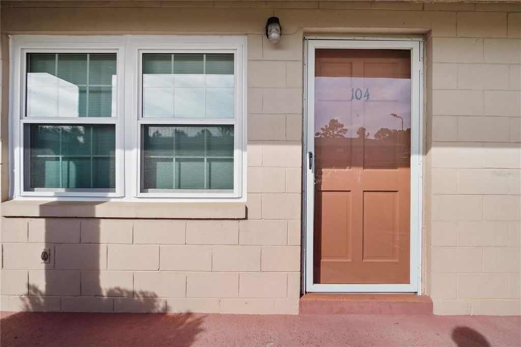 Photo of 1100 E Caroline Street #104, Tavares, FL 32778 (MLS # O6360774)