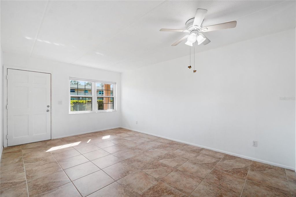 Photo of 1100 E Caroline Street #104, Tavares, FL 32778 (MLS # O6360774)