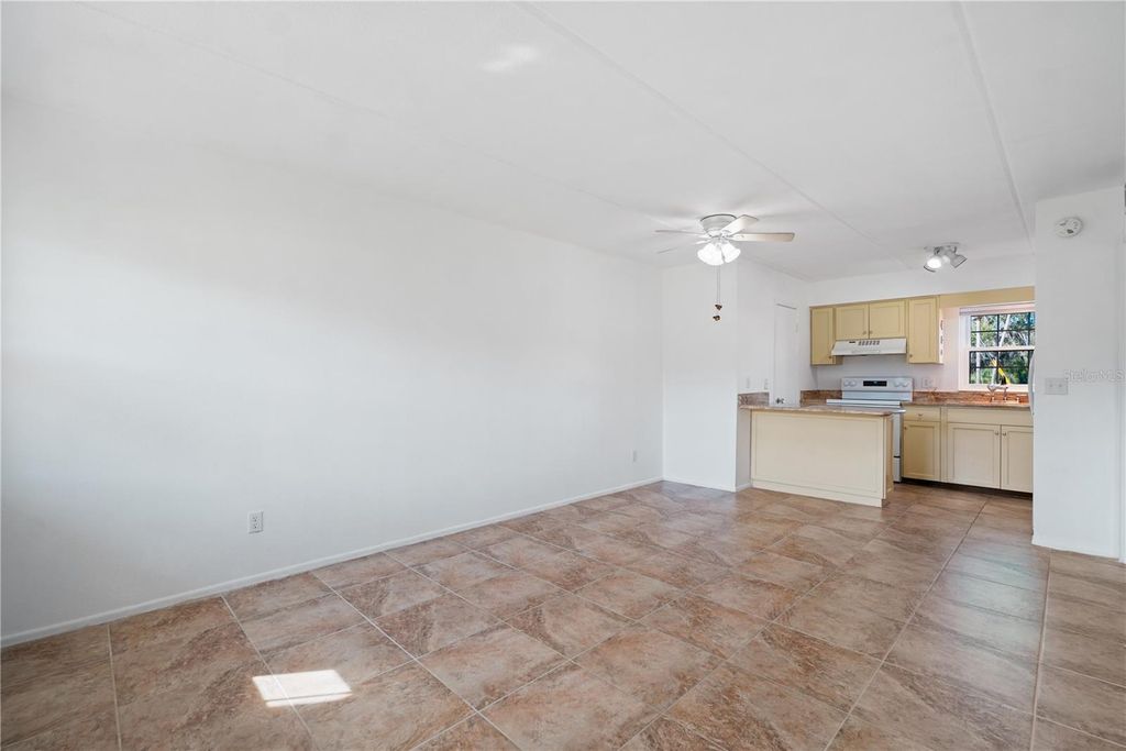 Photo of 1100 E Caroline Street #104, Tavares, FL 32778 (MLS # O6360774)