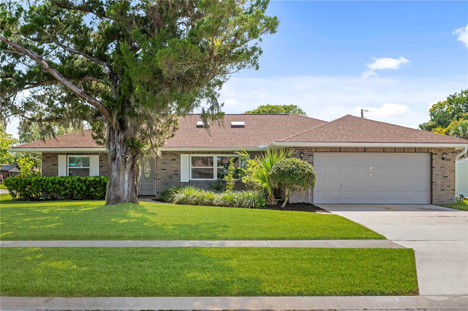 Welcome to your dream oasis! This beautifully updated three-bedroom, two-bathroom pool home combines modern luxury with effortless living. The open floor plan invites an abundance of natural light, thanks to brand new energy-efficient windows that not only provide peace of mind but also help you save on energy costs.
As you step inside, you'll be captivated by the sleek tile flooring that flows seamlessly throughout the home, offering both style and easy maintenance. The spacious living area leads to a chef’s dream kitchen, featuring a large eat-at island and exquisite stone counters that enhance the elegance of the space. With brand new stainless steel appliances, cooking and entertaining have never been more enjoyable.
Retreat to the impressive primary bedroom, a true sanctuary that boasts an en-suite bathroom designed for relaxation and luxury. Here, you’ll find a stunning floor-to-ceiling tiled shower, creating a spa-like atmosphere. The brand new vanity is adorned with beautiful quartz counters, seamlessly blending functionality with sophistication. This private space is perfect for unwinding after a long day.
The split bedroom layout of the home ensures privacy for homeowners and guest alike. The generously sized guest bedrooms share a well appointed guest bathroom.Â
Escape to your private backyard paradise, complete with a pristine swimming pool and a generous yard—ideal for hosting summer gatherings or simply basking in the sun.
With a roof installed in 2022, you can rest easy knowing that this home is built to last. Additional features include fresh interior/exterior paint and brand new privacy fence.
Located just a quick 10-minute drive from the beach, you’ll be close to all the vibrant offerings of South Daytona and Port Orange. Plus, with convenient access to I-95 and I-4, commuting is a breeze.
Don’t miss out on this exquisite blend of comfort, style, and convenience—your perfect home awaits!