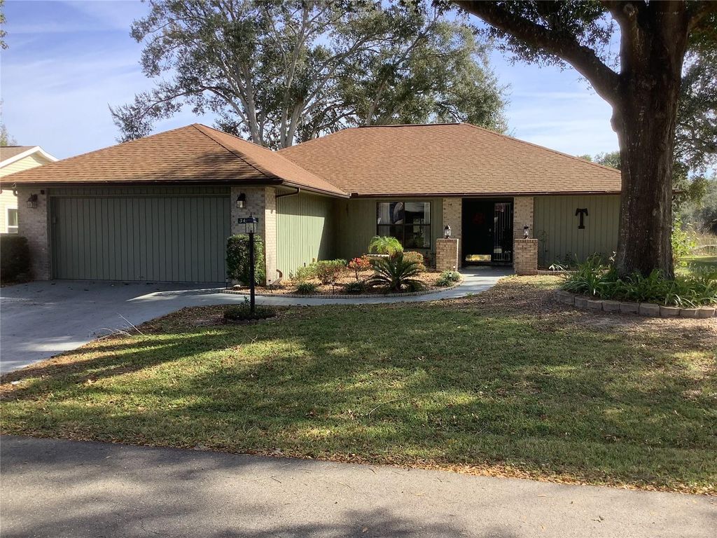 Photo of 34433 Cedarfield Drive, Dade City, FL 33523 (MLS # TB8487042)