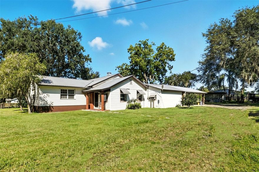 This charming 3 bedroom 2 bath farmhouse is nestled on 9.02 acres. Bring your animals, boats, play toys etc... This home features a 20x18 bonus room that can easily transform into another room or office space. Entering the kitchen you will find beautiful wood counter tops and wood cabinets, the kitchen features the dining area with big open windows. As you exit the kitchen you will enter the family room/study room with a beautiful wood burning fire place and an additional 18x20 spacious living room. The master bedroom has a walk in closet and a master bathroom down the hall features 2 more bedrooms and a bathroom. The home has a 2 car carport attached to the house and 2 more additional carports in the back of the home.
The property includes a 50x40 barn, this barn offers endless possibilities ideal for horses, livestock, storage, or your next big project. With plenty of room to grow, this peaceful setting provides both privacy and potential. Enjoy country living at its finest while staying close to modern conveniences.