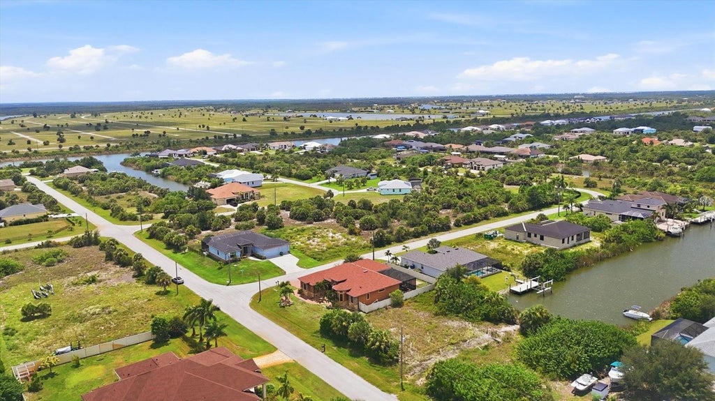 Photo of 10377 Harlingen St, Port Charlotte, FL 33981 (MLS # D6148713)