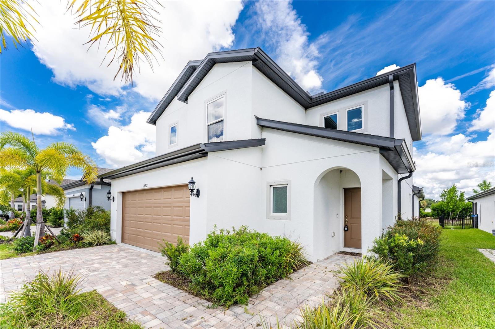 One or more photo(s) has been virtually staged. Discover your dream home in the heart of Port Charlotte! This gem features a screened-in lanai, perfect for relaxing or entertaining year-round. The seamless gutters ensure worry-free maintenance and added curb appeal. Inside, the customized master bedroom walk-in closet boasts an impressive shelving and organization system, making it a true retreat for your wardrobe. Enjoy added storage under the stairs and a built-in desk near the entrance. The versatile bonus room can serve as a formal dining area, den, library, or media room. The community boasts Centennial Park, Aquatic Center, playgrounds, and walking trails. Plus, you're close to Port Charlotte Mall, Regal Cinemas, restaurants, Englewood Beach, and El JoBean Fishing Pier. Experience Florida living at its finest—schedule your visit today!