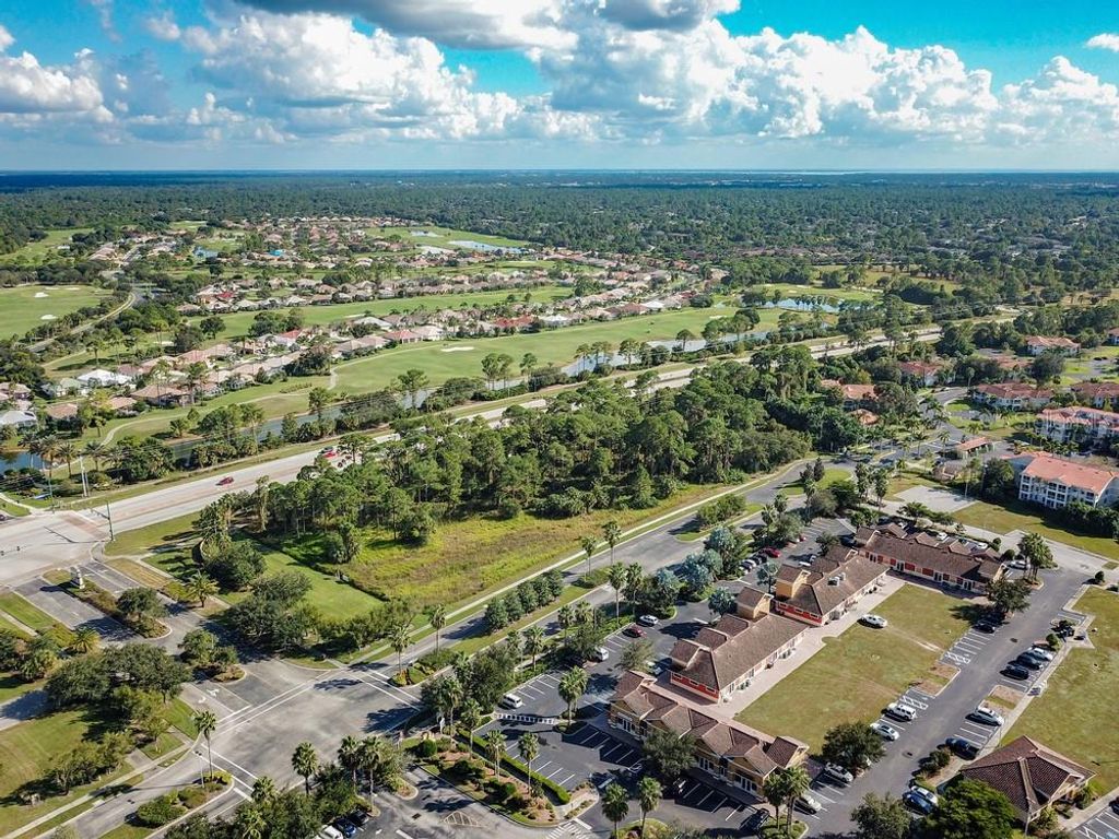 Photo of 3020 Bobcat Village Center Road, North Port, FL 34288 (MLS # A4553493)