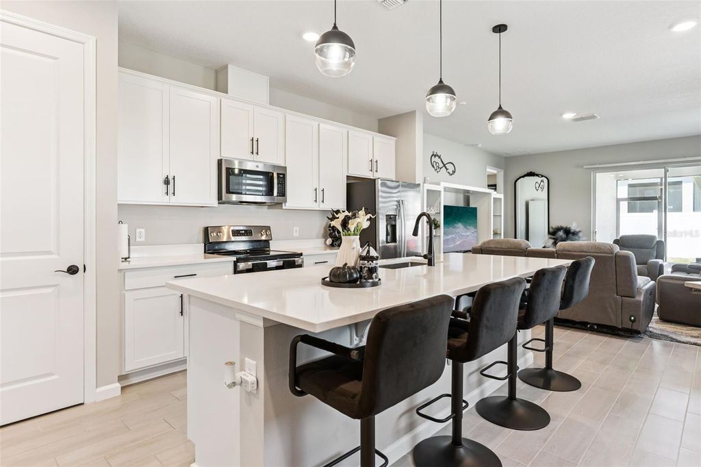 Photo of 891 Blue Creek Drive, Haines City, FL 33844 (MLS # O6393764)