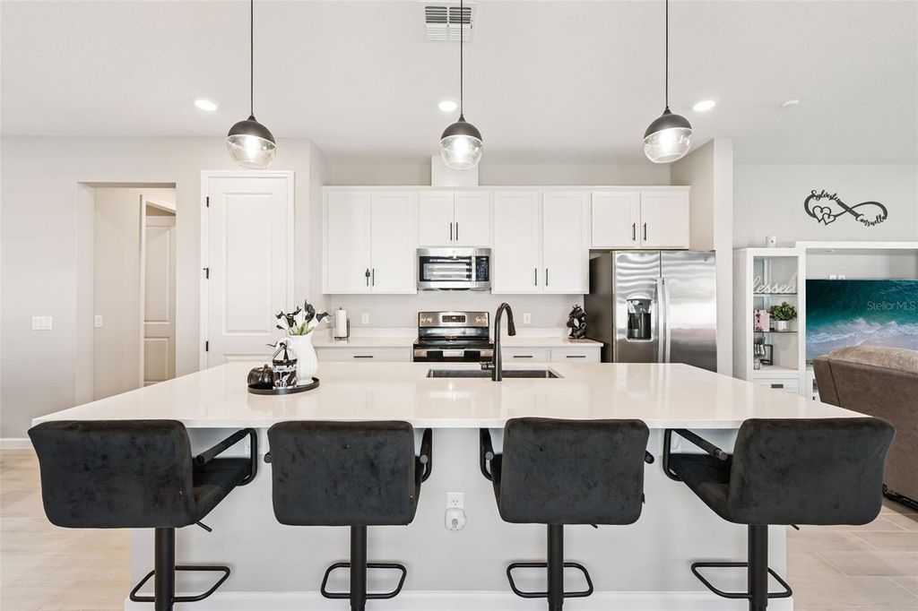 Photo of 891 Blue Creek Drive, Haines City, FL 33844 (MLS # O6393764)