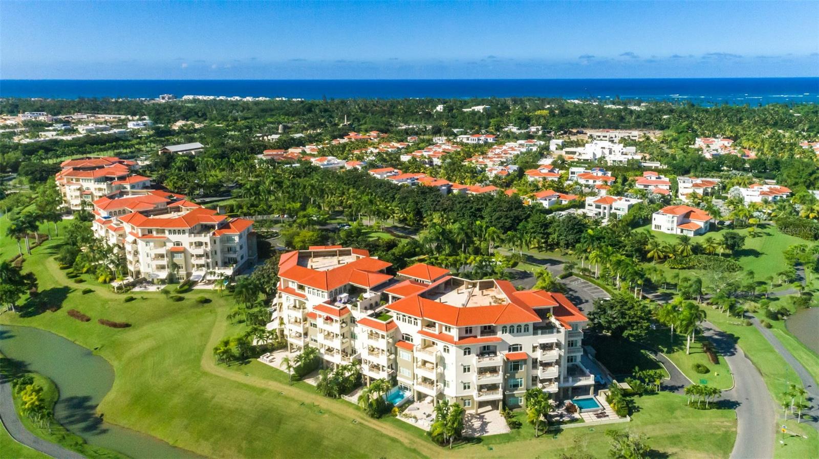 A rare opportunity to own one of the largest penthouses in Plantation Village Dorado Beach. Step inside and experience this amazing and unique Penthouse!
This impressive two-level penthouse located on the 4th and 5th floors, offers cathedral ceilings soaring 20’ and magnificent footprint of over 12,000 square feet of gross area including an expansive 8,000 sq.ft. of wood and marble flooring interior space and gracious 4,707 sq ft of covered and uncovered outdoor terrace spaces with sweeping views to the golf course and green mountains.
On the first floor there are two bedrooms, four full bathrooms and two powder rooms. The second floor includes four bedrooms, four full bathrooms and two powder rooms. Vast windows adding natural light to shine through, furniture and accessories, thoughtfully conceived layouts and so much more making this remarkable residence an authentic gem. This residence was meticulously created with top-of-the-line finishes and custom details by renowned artist and designer Carlos Mercado-AD Studio Contemporary Art and Design.
The gourmet kitchen is a place where you can have the most intimate and memorable dining experiences with loved ones or special guests.
The fully equipped office room provides direct access to one of the terraces. Enjoy a nice workout in your home gym which includes equipment from Body Solid. Next to the fitness room is the entertainment room with a pool table by Olhausen, manufacturer of the best billiards in the USA. The private theater outfitted with plush upholstered seating, dramatic cove lighting to make viewing the large projection screens even more enjoyable, will be your preferred room whether you enjoy watching movies, a World Series Game, or the Super Bowl. The apartment has a full automations system including Lutron lighting and Sonos sound throughout.
The open and covered terraces are the highlight of this residence where you can entertain the family and friends or simply have a relaxing time enjoying the panoramic view.
For your convenience this property includes 4 garages for two cars including two oversized parking spaces right next to the elevator. In addition, there are two additional uncovered parking spaces for four vehicles parked back-to-back.
Plantation Village is located in the Dorado Beach Ritz Carlton Reserve Resort, at a short golf cart drive from the Beach Club, the Water Mill Park, Fitness Center, tennis and basketball courts, golf course and the Club House with its two renowned restaurants.
This Penthouse is offered fully furnished and equipped with top of the line appliances, commercial grade gym equipment, a $50,000 race car simulator and two Tomberlin golf carts.
For further details of this impressive residence please don’t miss the video walkthrough.
Experience the ultimate lifestyle, location, and luxury at Plantation Village-Dorado Beach!
Private showings are only by appointment.
