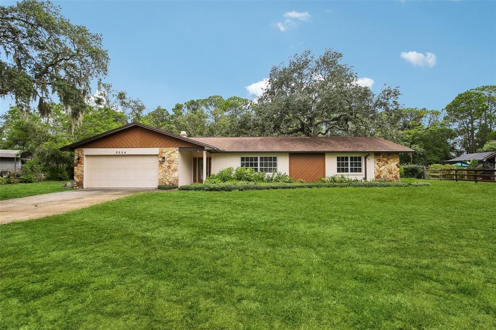 Photo of 9224 Lakeview Drive, New Port Richey, FL 34654 (MLS # TB8528778)