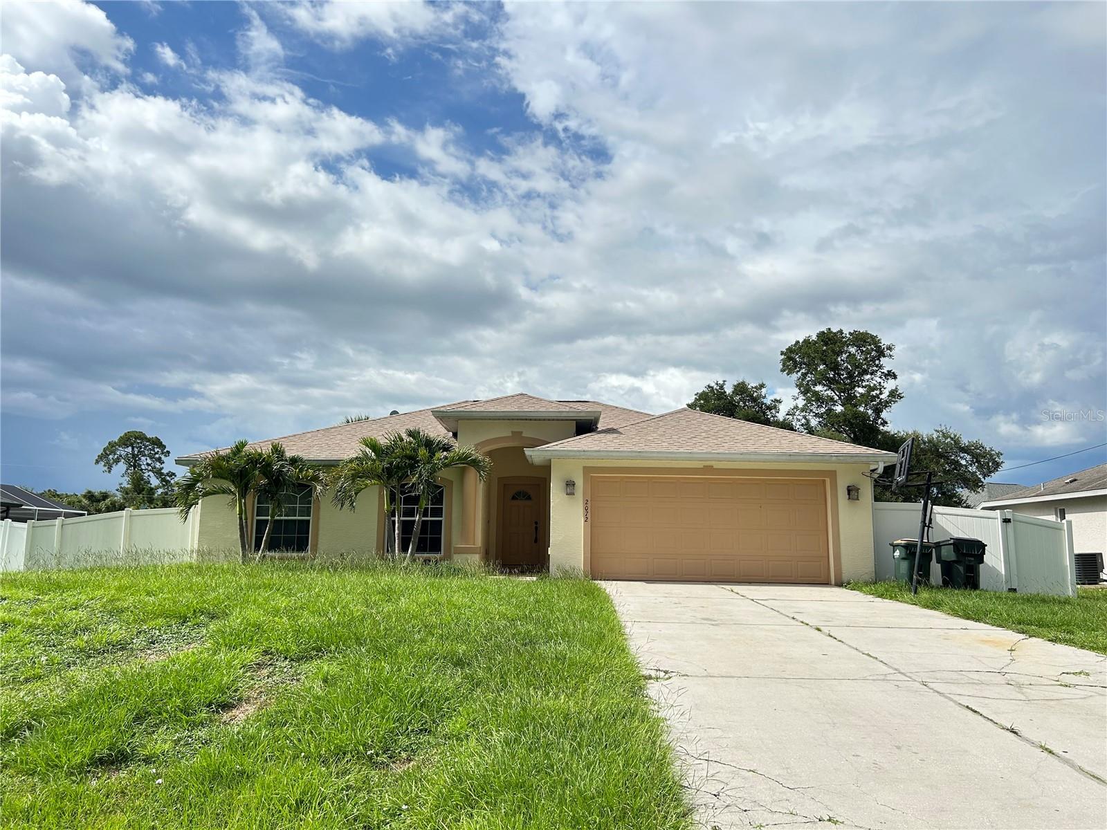 This charming home features 3 bedrooms, 2 bathrooms, and a 2-car garage with an automatic door opener.
The screened-in lanai provides a relaxing space, and fenced backyard adds privacy to enjoy the outdoors. The kitchen has wooden cabinetry, granite countertops, and stainless-steel appliances, and opens to a cozy breakfast area.
An indoor laundry room includes shelves. The home is finished with tile flooring throughout, offering both style and easy maintenance.
The spacious primary bathroom boasts a tiled walk-in shower, double vanity, a medicine cabinet, and a private toilet area. The guest bathroom features a tiled shower, along with a modern vanity and mirror.
Stylish, contemporary faucets complement both bathrooms and the kitchen. This well-located property is close to major roads, highways, grocery stores, and restaurants making everyday living both comfortable and convenient.