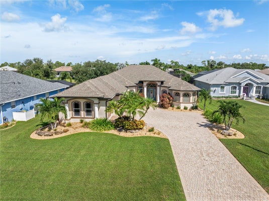 1098 BOUNDARY BLVD, ROTONDA WEST, FL 33947 - Image 70568e424bd601dfb89a65d089a2fbd7/2050962903