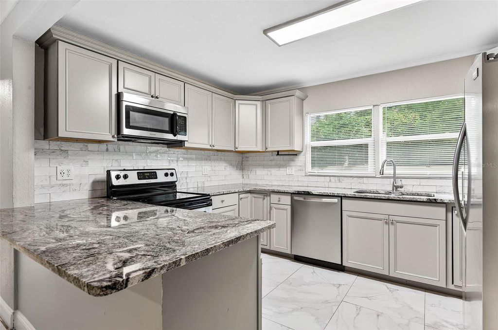 Photo of 1345 Parkwood Street, Clearwater, FL 33755 (MLS # TB8437988)