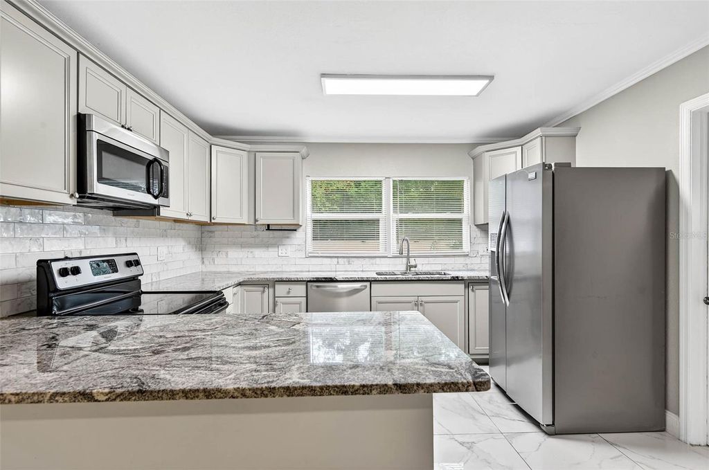 Photo of 1345 Parkwood Street, Clearwater, FL 33755 (MLS # TB8437988)
