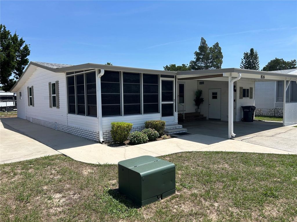 Photo of 816 Polo Park East Boulevard, Davenport, FL 33897 (MLS # O6309086)