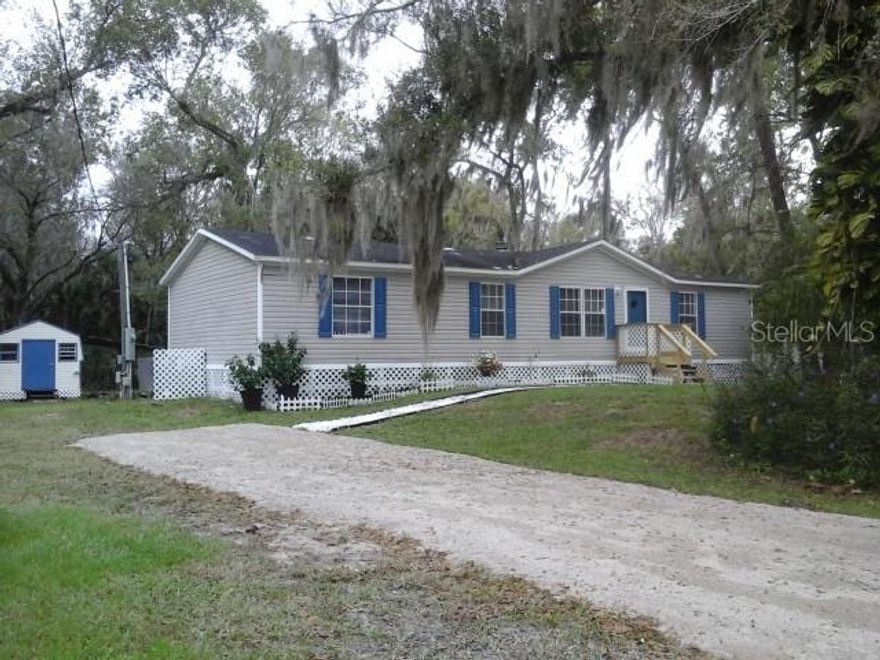 Very good buy in NSB!! On this nice, fresh, manufactured home in New Smyrna Beach, with a yard  large enough for your all  toys! AND NO LOT RENT!! The home is a 3/2 split plan layout.  New laminate 'wood'  floors, new carpet, new kitchen counters, garden sink, faucet and appliances.  ALL bedrooms have walk-in closets.  The Master has a new garden tub, 2-seat shower and new counter, sink, with "lighted" faucets .  The guest bath has a tub, new counter, sink and "lighted" faucets.  There is a wood-burning fireplace and inside laundry .  Designer light/fan fixtures are very impressive.  New landscape out front and a storage building out back.   When you say this location is close to everything, it's not an exaggeration:  close to Post Office, numerous Restaurants, Banks, 2 grocery stores, Convenience stores, NSB Elementary, NSB High School and Daytona State College NSB Campus , and movie theater.   You can't beat the location!!  Minutes to the best beach in Volusia County and top-notch fishing and boating,  in the Inter Coastal Waterway.  20 minutes to Daytona and Worlds Most Famous Beach, and Speedway 1-hour to Disney attractions.  Easy to view. GREAT RENTAL POSSIBILITY. Please put me on your list!  Measurements are approximate.  Discounted price for Cash.  AS-IS ;Water: City