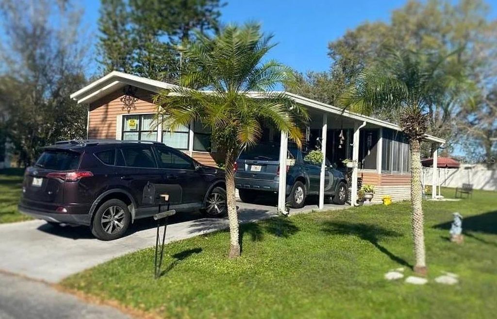 Photo of 48 Butler Blvd Blvd W, Haines City, FL 33844 (MLS # S5145029)