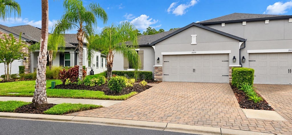 Photo of 19379 Hawk Valley Drive, Tampa, FL 33647 (MLS # TB8546046)