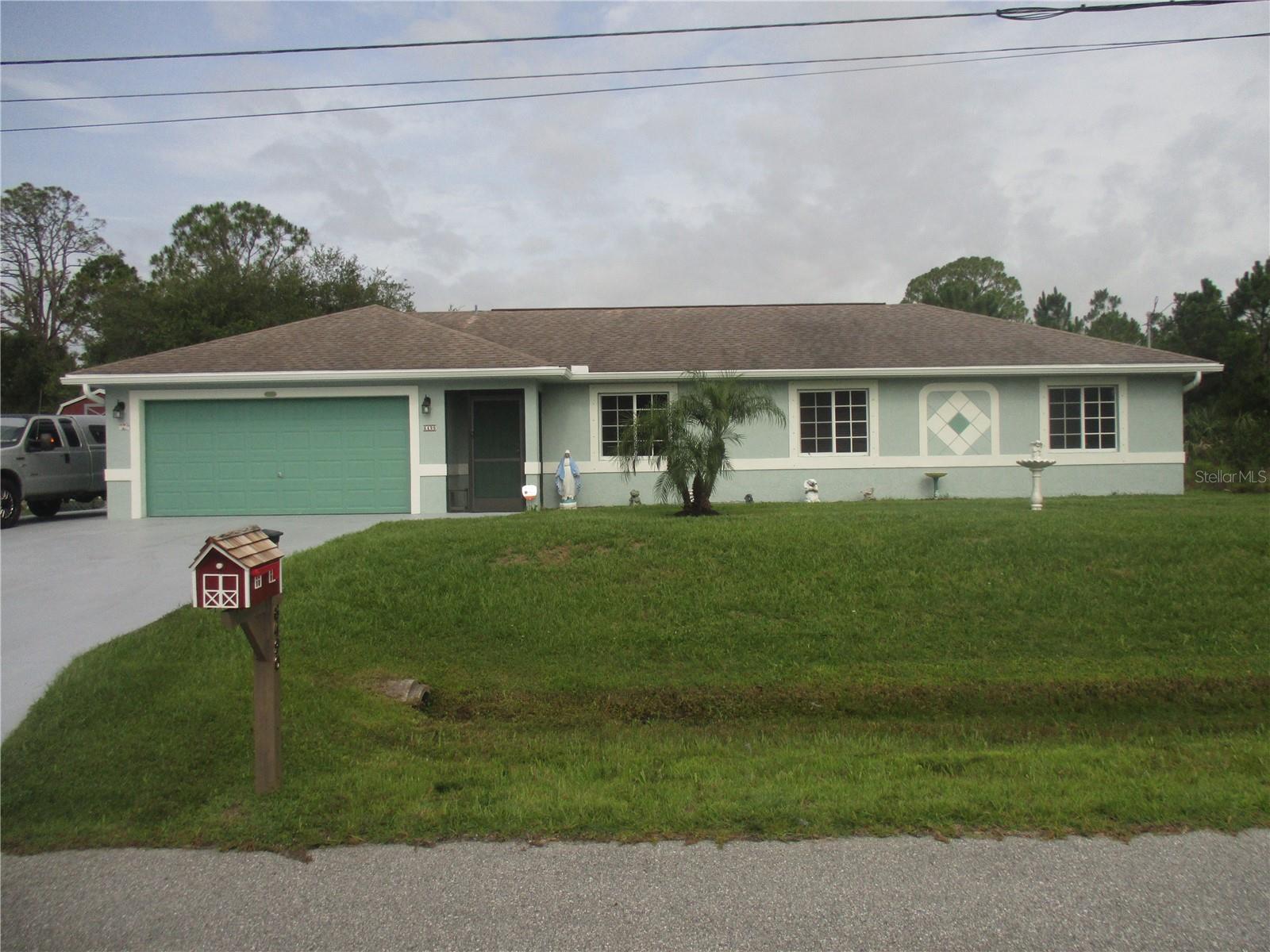 Additional lot added to the side property to make almost 1/2 acre .This beautiful home is in a peaceful neighborhood, offering a serene county setting. Floors are vinyl plank throughout, makes for easy maintenance and a modern look. The kitchen has granite countertops and solod wood cabinets. This home has 2 storage sheds in the rear of the lot, proving storage for lawn equipment, bikes, and any other sports equipment that needs to be protected from the outdoors. The solar system keeps the monthly electric bill at a very low cost. The additional lot has a cement slab and the extended driveway leading up to the slab.