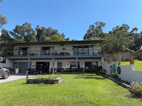 Photo of 521 E Mirror Lake Drive, Fruitland Park, FL 34731 (MLS # G5118106)