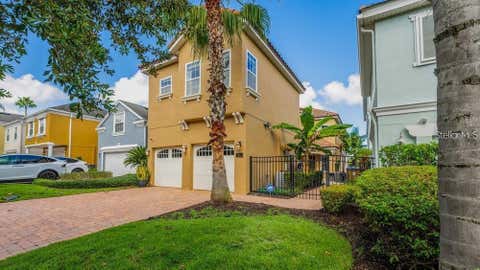 Photo of 7411 Excitement Drive, Reunion, FL 34747 (MLS # O6411485)