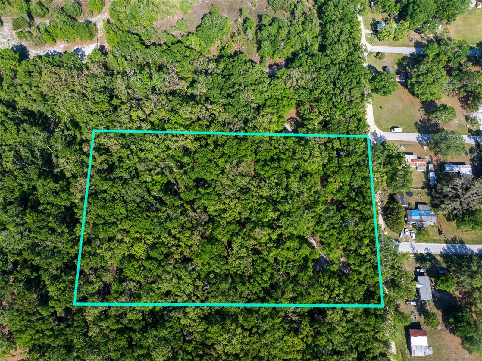 Discover your own piece of Florida paradise in the heart of Levy County. This 4.77-acre parcel is high and dry (Zone X), with no flood zone and no wetlands. Zoned Agricultural Rural Residential, it offers the freedom to build a single-family home, tiny home, manufactured home, barndominium, or even add a mother-in-law suite. Perfect for a small farm or hobby homestead—animals are allowed.
With 50 ft front and rear setbacks and 10 ft side setbacks, there’s plenty of room to create your ideal layout. Located just a short drive from Manatee Springs State Park, the Nature Coast State Trail, and the Suwannee River. Whether you’re building your forever home or investing in a peaceful retreat, this property offers space, flexibility, and lifestyle potential in a growing area.