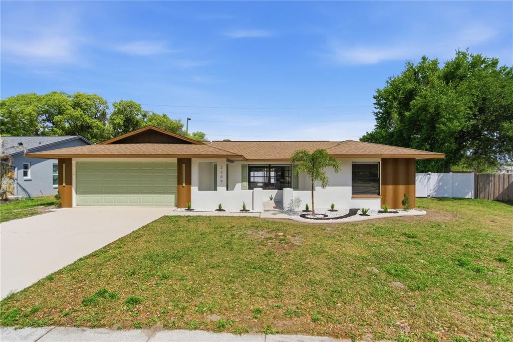 Photo of 2309 Pin Oak Lane E, Clearwater, FL 33759 (MLS # TB8493600)