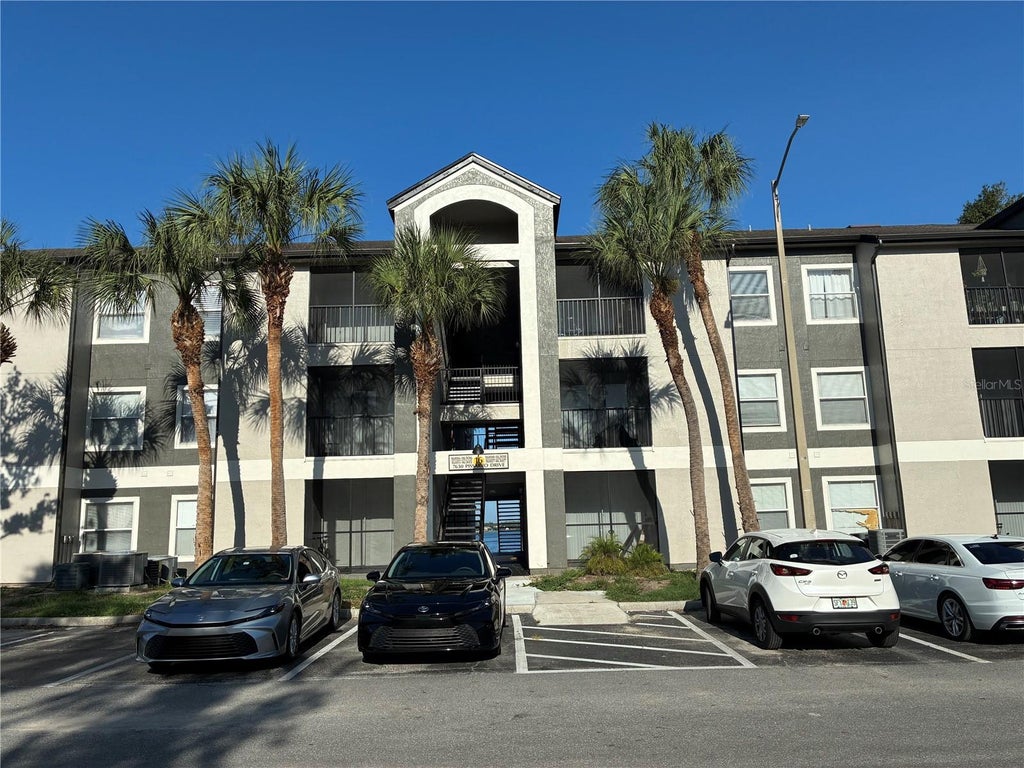 Photo of 7630 Pissarro Drive #16206, Orlando, FL 32819 (MLS # O6436430)
