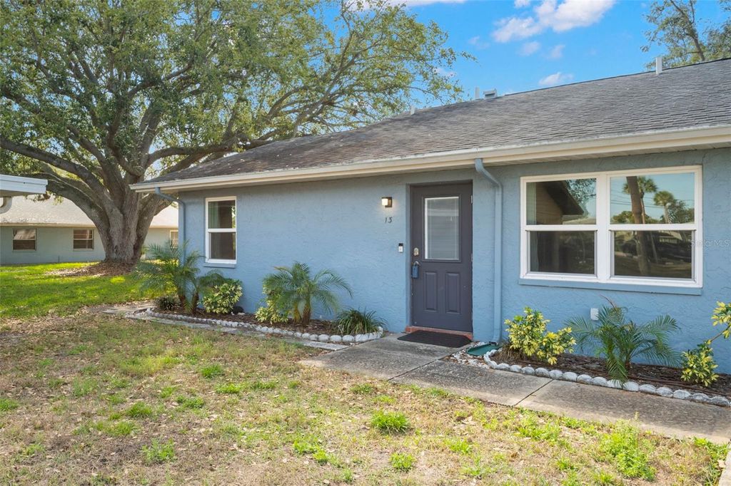 Photo of 1904 Canterbury Lane #13, Sun City Center, FL 33573 (MLS # TB8495310)