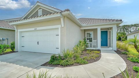 Photo of 10105 Canaveral Circle, Sarasota, FL 34241 (MLS # A4674512)