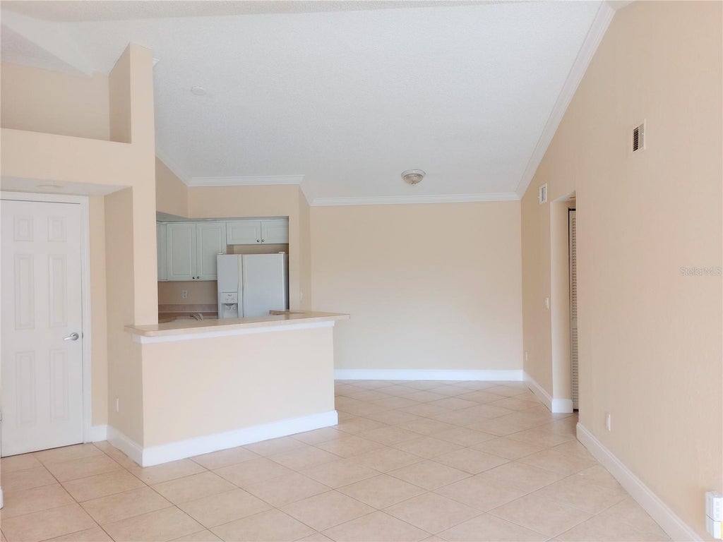 Photo of 5737 Gatlin Avenue #428, Orlando, FL 32822 (MLS # O6447994)