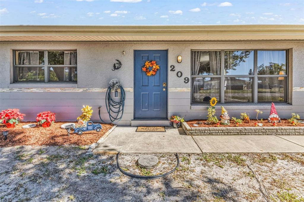 Photo of 209 Seminole Boulevard NW, Port Charlotte, FL 33952 (MLS # C7516185)