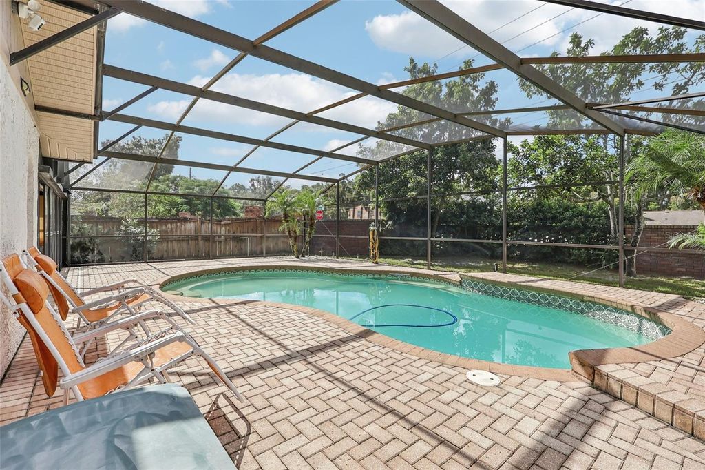 Photo of 9913 Chesham Drive, Orlando, FL 32817 (MLS # O6354182)