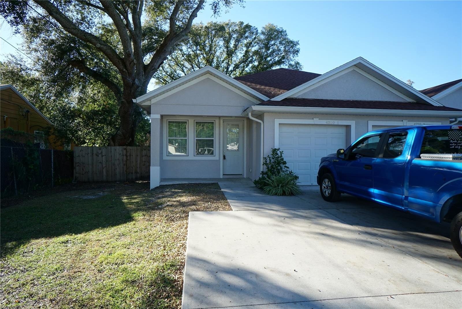 Available Now: Single story 3 Bedroom, 2 Bath, 1 car garage villa located in Drew Park near Hillsborough Community College. New Contemporary layout designed with millennial in mind. Villa features wood look tile throughout, fenced yard, laundry area equipped with washer and dryer, combined living/dining area, and spacious bedrooms. A single car garage leads into the beautiful kitchen that features a large island perfect for bar-style eating or entertaining, plenty of stone counter space, and lots of cabinet space. Stainless kitchen appliances include side-by-side refrigerator, dishwasher, smooth top range, and microwave hood. The master bedroom has an en suite bathroom with large glass shower and walk-in closet. The two other bedrooms share the hall bath equipped with tub/shower combo. Water, sewer and lawncare included in rent. Pets OK. No HOA. Conveniently close to Veterans Expressway, Tampa International Airport, shopping and restaurants.
All Hoffman Realty residents are enrolled in the Resident Benefits Package which is an additional $49/month, payable with rent and includes utility concierge service making utility connection a breeze during your move-in, HVAC air filter delivered monthly (for applicable properties), our best-in-class resident rewards program, online maintenance portal, online rent payment portal, one late-fee waiver and much more!
If you decide to apply for one of our properties, there is an $99 per adult application fee that is non-refundable. Anyone aged 18 or above who will be residing at the property must apply. We will (1) check your credit report; (2) check for any past evictions; (3) verify your employment, if applicable; (4) personal income, assets, or assistance must be sufficient and verifiable; (5) verify your previous landlord references; and (6) perform criminal background screening; (7) be aware that some associations also have application fees. We encourage you not to apply if you have bad credit references or poor rental history.