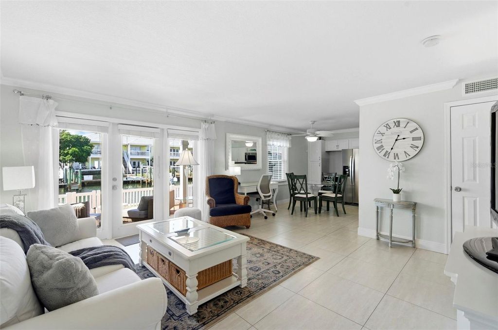 Photo of 4911 Coquina Key Drive SE #C, St Petersburg, FL 33705 (MLS # TB8483439)