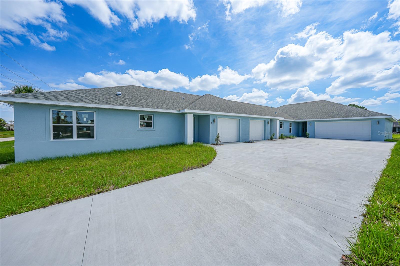 This nearly completed WATERFRONT TRIPLEX in Rotonda West, FL, is approaching its Certificate of Occupancy—an EXCEPTIONAL INVESTMENT OPPORTUNITY! The property includes three units: two with 1,351 sq ft featuring three bedrooms, two bathrooms, and a single-car garage, and a larger third unit offering 1,794 sq ft with three bedrooms, two bathrooms, a TWO-CAR garage, plus an additional OFFICE or BONUS ROOM. The rear porch of the larger unit provides FULL WATER VIEWS.
Each ENERGY EFFICIENT residence is equipped with HIGH-END FINISHES including IMPACT-RESISTANT WINDOWS, recessed lighting, ceiling fans, luxury vinyl plank flooring, QUARTZ COUNTERTOPS, stainless steel appliances, shaker-style ivory kitchen and vanity cabinets with soft-close drawers, full-height tile backsplashes in the kitchen, energy-efficient LED lighting, brushed nickel fixtures, and epoxy-coated garage floors, blown in insulation among other premium features. Detailed floorplans show split-bedroom layouts, an open great room and dining area, foyer entry, INDOOR LAUNDRY, and walk-in closets in the primary suites.
Located on the freshwater Rotonda River canal, the community offers plentiful outdoor activities such as fishing and exploring 23 miles of canals by kayak, canoe, or small boat. Amenities include five golf courses offering 99 holes, scenic walking and biking trails, a 165-acre park with playgrounds, peaceful lakes, beautiful gardens, and a new community center. Nearby, pristine Gulf Coast beaches like Englewood and Boca Grande are easily accessible. The area is well known for excellent fishing opportunities with numerous marinas, piers, and boating facilities close at hand. For leisure and shopping, downtown Punta Gorda and Englewood’s Dearborn Street feature charming shops, local eateries, and farmers' markets. The property enjoys convenient access to regional and local airports as well!
Don’t miss out on this outstanding opportunity for generating substantial RENTAL INCOME! Live in one and rent the other two out!! Please refrain from visiting the property without prior authorization.