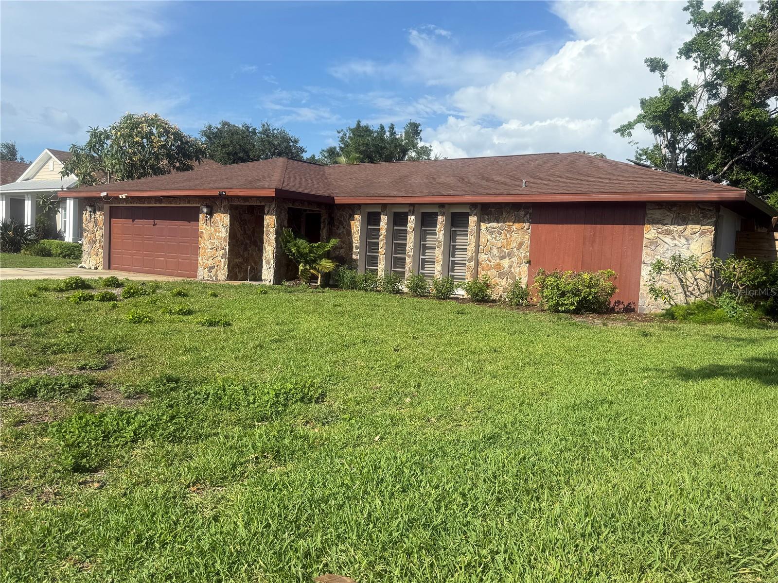One or more photo(s) has been virtually staged. Virtually Staged | Assumable VA Rate Available- you don't have to be a veteran to take advantage of a VA Loan| NEW FLOORING APRIL 2025 - Stunning Pool Home in Prime West Bradenton Location. Tucked away in the peaceful enclave of Harbor Woods, this beautifully updated 3-bedroom, 2-bath pool home offers the perfect blend of charm, comfort, and convenience. Located between Manatee Ave W and Riverview Blvd, this friendly neighborhood of just 125 homes is ideal for morning walks, evening strolls, and a true sense of community. Step inside and fall in love with the soaring cathedral ceilings and a dramatic stone wood-burning fireplace that anchors the spacious family room. The split bedroom layout offers privacy, while the primary suite opens directly to the screened lanai and sparkling pool—your personal oasis! The kitchen is designed for both everyday living and entertaining, featuring granite countertops, wood cabinetry, a breakfast bar, and a pass-through window to the lanai. The bright breakfast nook also opens to the pool area, making indoor-outdoor living seamless! Updates include:2021 A/C system with 3-zone climate control-2024 stainless appliances(refrigerator, range, microwave)-2021 pool pump-Roof replaced in 2018. Live just minutes from Robinson Preserve, Palma Sola Botanical Gardens, DeSoto National Memorial, and a public boat ramp—plus, the sugar sand beaches of Anna Maria Island are only 10–15 minutes away. Whether you’re into kayaking, beachcombing, dining out, or just soaking in the Florida sun, this home puts it all within easy reach. Don’t miss your chance to own a slice of paradise!