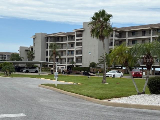 AMAZING Waterfront lifestyle awaits you at the SAND PEBBLE waterfront condo community! 1st floor (the ground level is parking) Take elevator or short stairs to the 1st level. This unit is fully furnished including kitchen wares. (ground level covered parking) The VIEW is absolutely breathtaking! Spectacular Gulf of Mexico water views from living areas + primary bedroom. Furnishings are upscale, King bed in primary, Queen bed in 2nd guest bedroom. Massive walk in closet in primary with high end ensuite bath! LUXURY finishes & Gulf views await you! Boat ramp & onsite boat storage (inquire with condo HOA of available boat storage / fees) Luxury kitchen with stainless appliances + sparkling quarts countertops and glass backsplash. Inside kitchen laundry with stackable W & Dryer. Gulf view patio is enclosed & accessible from living + primary bedroom. Watch boats, dolphins and amazing water birds of Florida every day! Guarded gate for added security. Extra ground level storage. Dead end road & close to marinas, waterfront restaurants and parks. This is an amazing value offering upscale furnishings & waterfront lifestyle. Community amenities include pool area overlooking gulf waters, putting green, boat ramp, tennis courts, welcoming clubhouse, library, game rooms PLUS fitness Tenant pays for electricity only ! Water, sewer & trash + internet are included in the lease! Move in ready ! Easy trash shoot just steps from your condo door for easy maintenance of trash ! No pets.