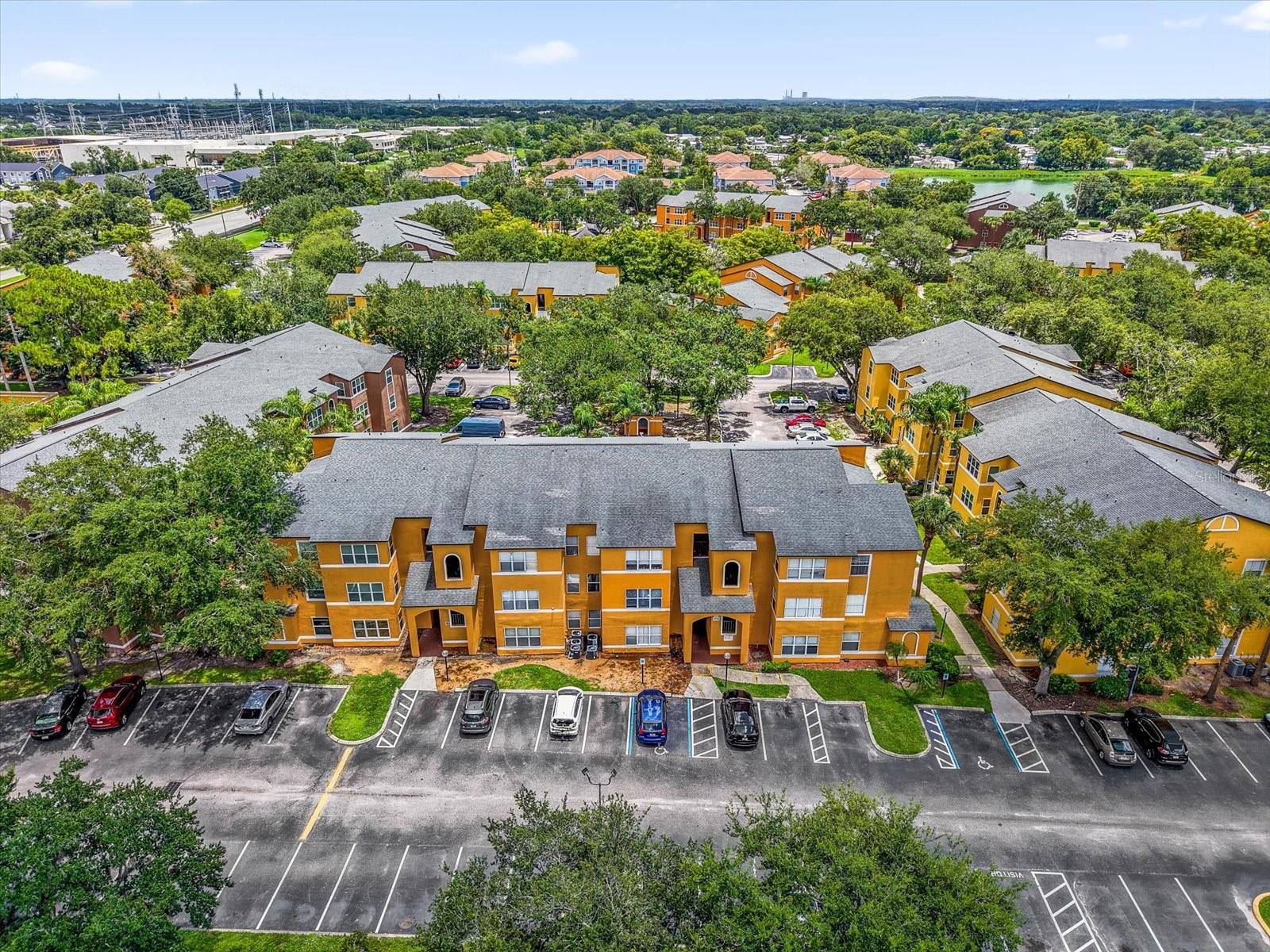 **This property qualifies for a closing cost credit up to $2,400 through the Seller’s preferred lender.** Welcome home to this meticulously maintained 2-bedroom, 2-bathroom condo offering over 1,000 square feet of comfortable living space in the GATED community of Venetian in Orlando. This bright and inviting home features an open floor plan with large windows that allow natural light to pour in, creating a spacious and airy feel throughout. The kitchen includes a full suite of STAINLESS STEEL APPLIANCES and opens seamlessly to the dining and living areas, making it ideal for both everyday living and entertaining. Both bedrooms are generously sized, each with a LARGE WALK-IN CLOSET and its own EN-SUITE BATHROOM, offering privacy and convenience. Recent updates include a NEW ELECTRIC WATER HEATER (2022) and UPDATED BATHROOM PLUMBING, while the building’s ROOF AND WINDOWS were replaced in 2018. offering peace of mind for years to come. An INTERIOR LAUNDRY ROOM with washer and dryer is also included. Whether you're a first-time buyer or savvy investor, this condo is a fantastic opportunity for low-maintenance living or rental income. Enjoy the amenities of the Venetian community including a pool, clubhouse, tennis courts, and fitness center all just minutes from the airport, major highways, dining, and shopping. Schedule your showing today!