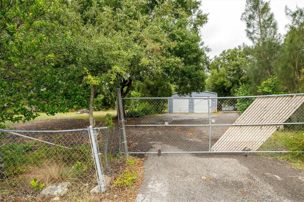 Photo of 19231 Causeway Boulevard, Land O Lakes, FL 34638 (MLS # TB8434516)