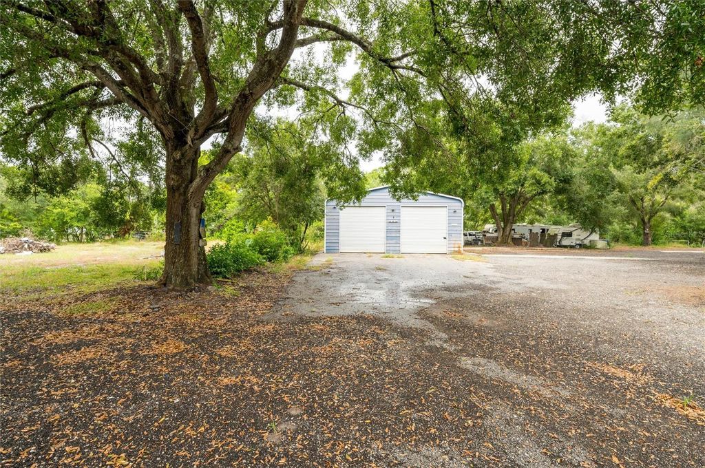 Photo of 19231 Causeway Boulevard, Land O Lakes, FL 34638 (MLS # TB8434516)