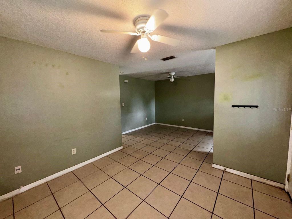 Photo of 6741 Magnolia Pointe Circle, Orlando, FL 32810 (MLS # O6385482)