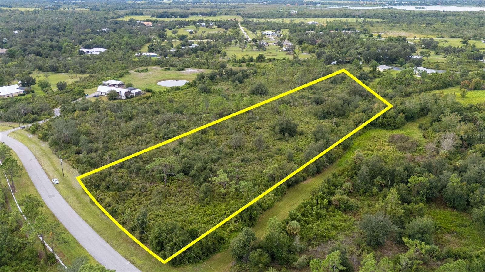Build your DREAM HOME with just over 5-ACRES in Prairie Creek. Need a builder? Let us introduce you to reputable local builders. Prairie Creek offers 22 miles of groomed green belt horse riding trails for the horse enthusiast, where you can experience the pinnacle of luxury living; privacy, access to hiking and horseback riding trails. Prairie Creek Park community also minutes to Shell and Prairie Creeks—offering kayaking and boating access just a mile away Punta Gorda's airport, vibrant downtown, boutiques and dining options are just 15 minutes away, with easy access to I-75 and boating, fishing, and golf nearby.