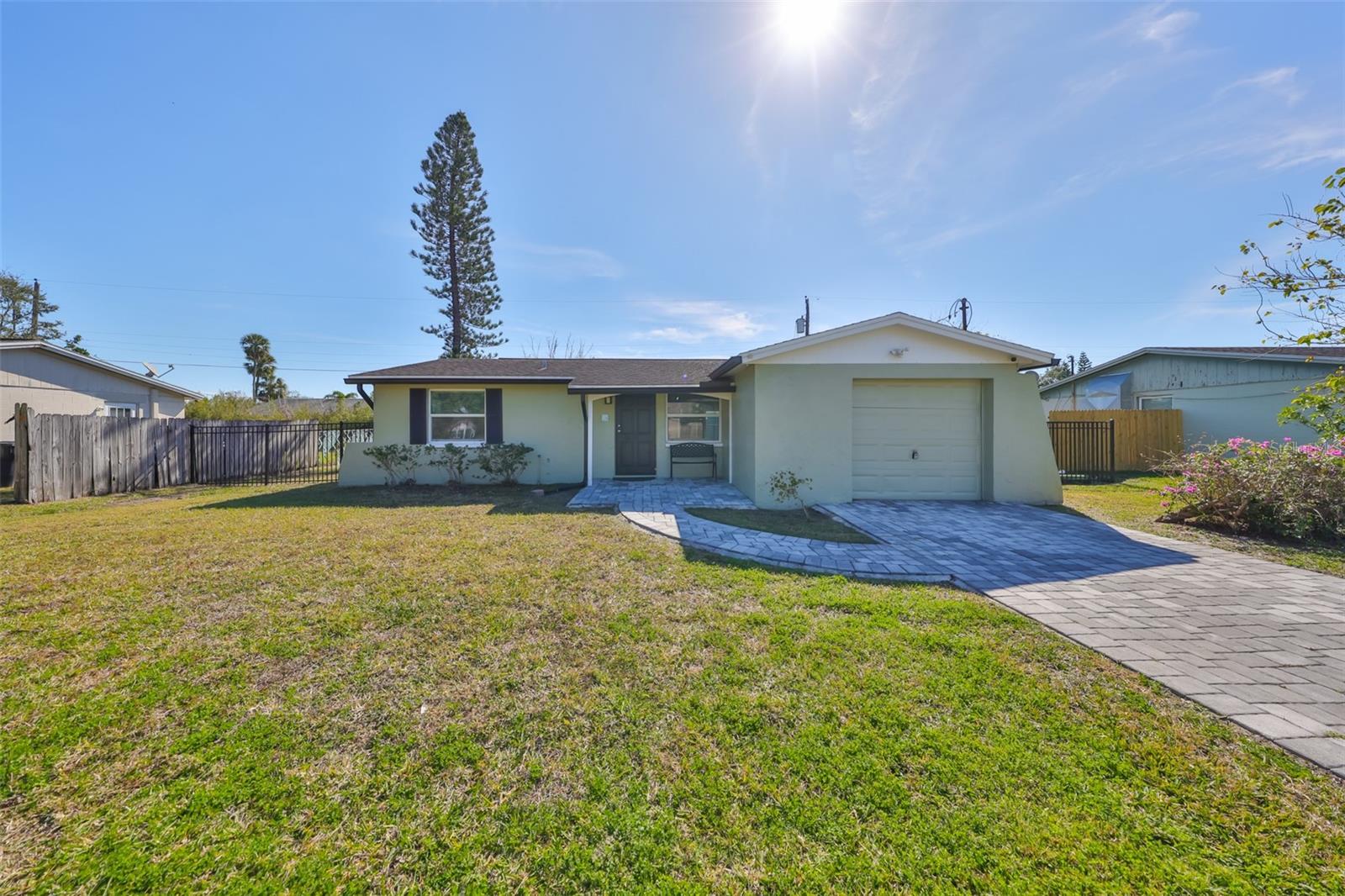 This beautifully updated 3-bedroom home in Apollo Beach offers a wonderful combination of modern upgrades and convenience. Move-in ready with tile flooring throughout the entire home. The kitchen was remodeled in 2020 with upgraded plumbing, featuring new cabinets, a new sink, and sleek granite countertops. The island and breakfast bar overlook an open space that can be used as a dining area or additional living space. The spacious family room is perfect for entertaining. The A/C unit comes with an ultra-violet screen for enhanced allergy and bacteria safety. New hurricane-resistant windows were installed in 2020, including the double sliding doors. The home interior is neutrally painted. Three generously sized bedrooms and an updated bathroom provide comfort and style. Enjoy the front porch and covered back patio that overlooks the large, fully fenced backyard. TANKLESS water heater. This home is ideally located with an easy commute to downtown Tampa, MacDill AFB, Brandon, and Sarasota. Convenient access to US-41, I-75, and Hwy 301. A wide variety of restaurants, shops, and medical facilities are nearby. Landscape included in the rent. Pets allowed with landlord approval. Renter's insurance must be obtained by tenants.