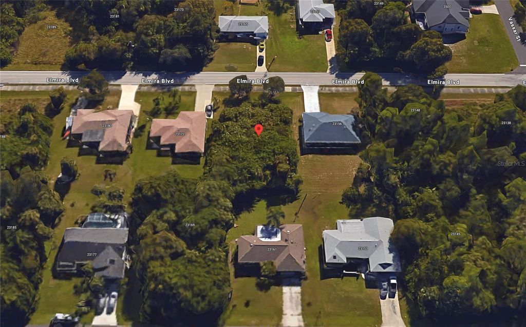 Photo of 23164 Elmira Boulevard, Port Charlotte, FL 33980 (MLS # C7514317)
