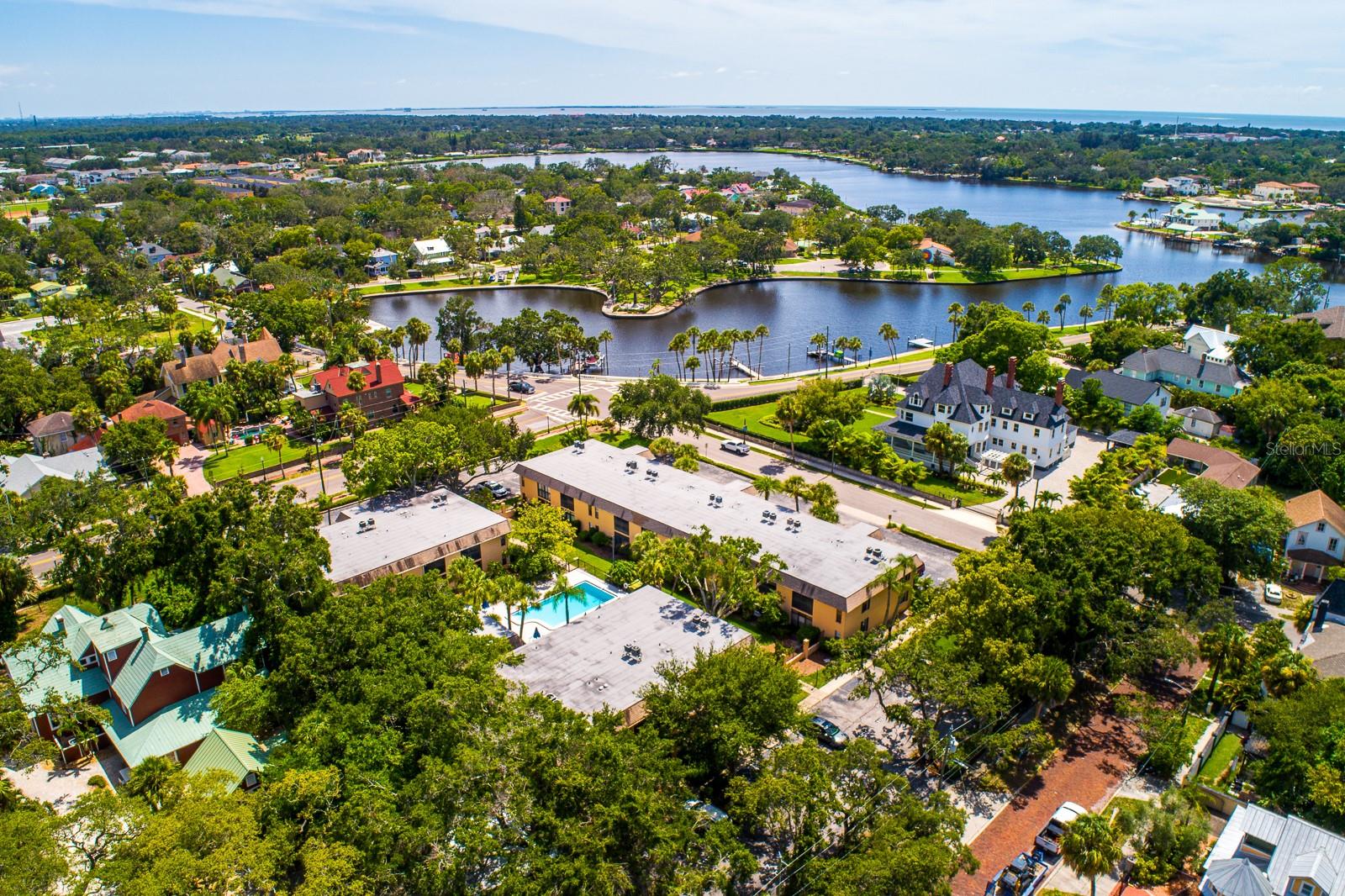 Discover this beautifully updated 2-bedroom, 2-bathroom first-floor condo nestled in a peaceful, well-maintained community with a resort-style feel. Offering 924 sq ft of inviting living space, this fully furnished unit combines style, comfort, and convenience—perfect for seasonal getaways or full-time living.
Step inside to find fresh laminate flooring and new interior doors throughout. The modern kitchen features sleek stainless steel appliances, an induction cooktop, a ceiling fan, and rich wood cabinetry for ample storage. The open-concept living area flows effortlessly onto a private lanai, where you’ll also find a convenient laundry closet.
The spacious primary suite includes sliding glass doors to the lanai, a walk-in closet, and an ensuite bathroom with a walk-in shower. A second generously sized bedroom, also with a walk-in closet, sits next to the guest bathroom with a tub/shower combo—ideal for visitors or family.
Enjoy poolside views from your windows and the serenity of a quiet, intimate complex. The 3-year-old AC unit adds peace of mind, while the low HOA fee covers common area taxes, community pool, escrow reserves, fidelity bond, insurance, exterior maintenance, pest control, sewer, water, trash—making for truly carefree living.
Whether you're looking for a low-maintenance home near the Gulf or an investment in a prime location close to Fred Howard Park, Sponge Docks, and charming downtown Tarpon Springs, this property checks every box.