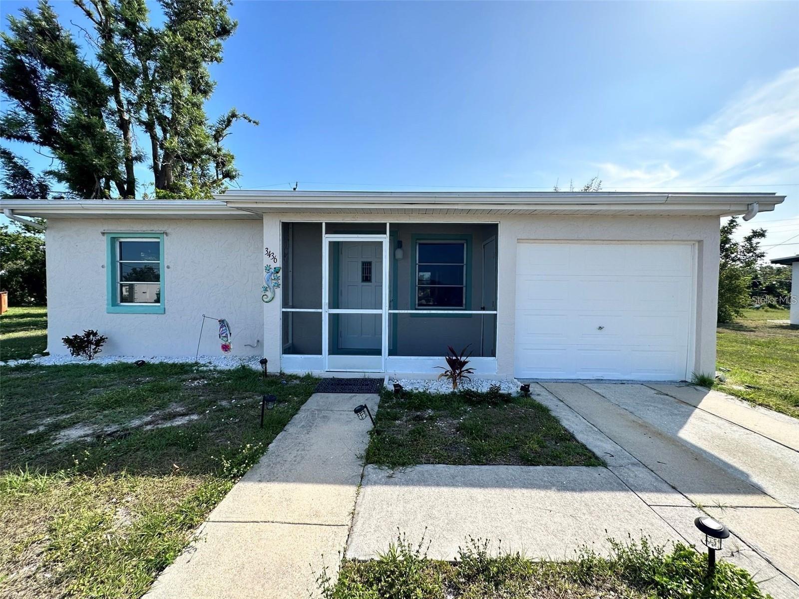Located right in the HEART of PORT CHARLOTTE. This charming 2-bedroom, 1-bathroom gem is a great BANG FOR YOUR BUCK! Remodeled in 2021, which included all new kitchen appliances and vinyl plank flooring throughout. Super cozy layout and it comes with a 1 car garage. HUGE PRIVATE BACKYARD. NO HOA, NO DEED RESTRICTIONS. CITY WATER and CITY SEWER. New AC 2025. Updated Electrical Panel 2022. Ideal for first time buyers, downsizers or as a great long or short-term investment property. Schedule your tour today!