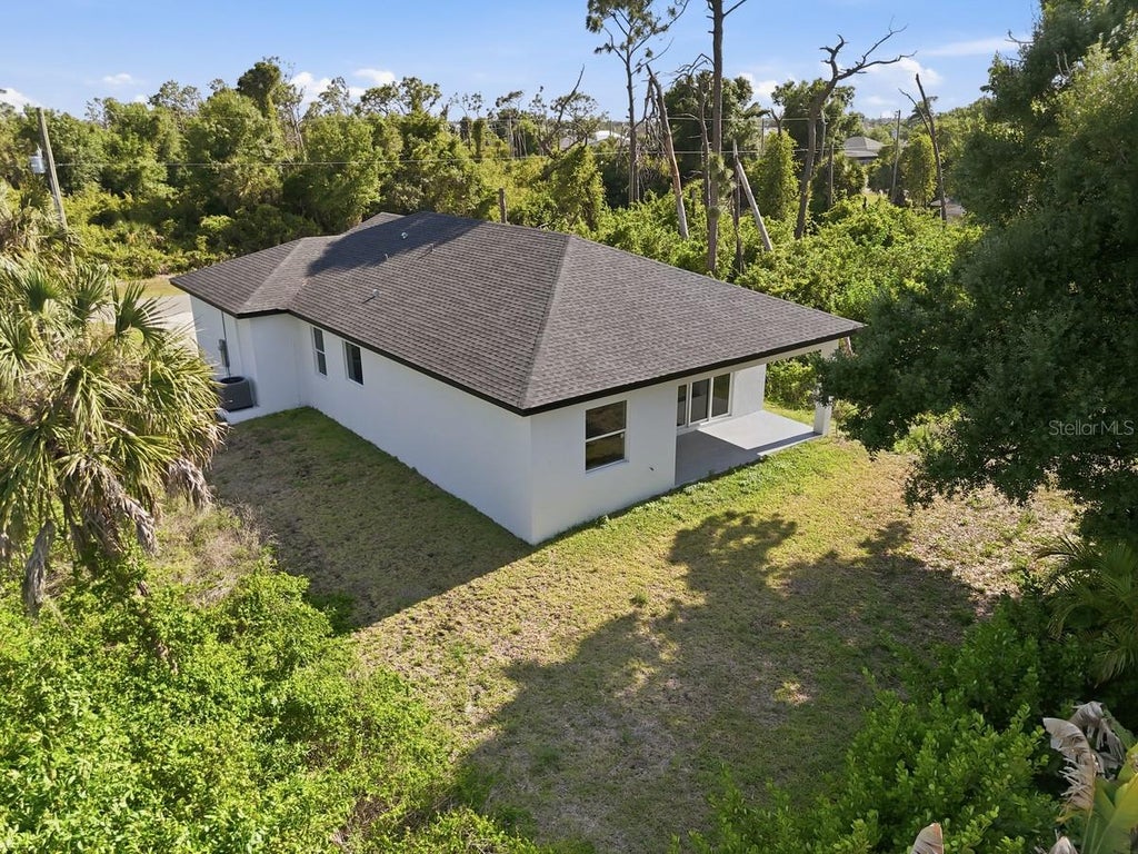 Photo of 136 Lomas Road, Rotonda West, FL 33947 (MLS # O6448588)